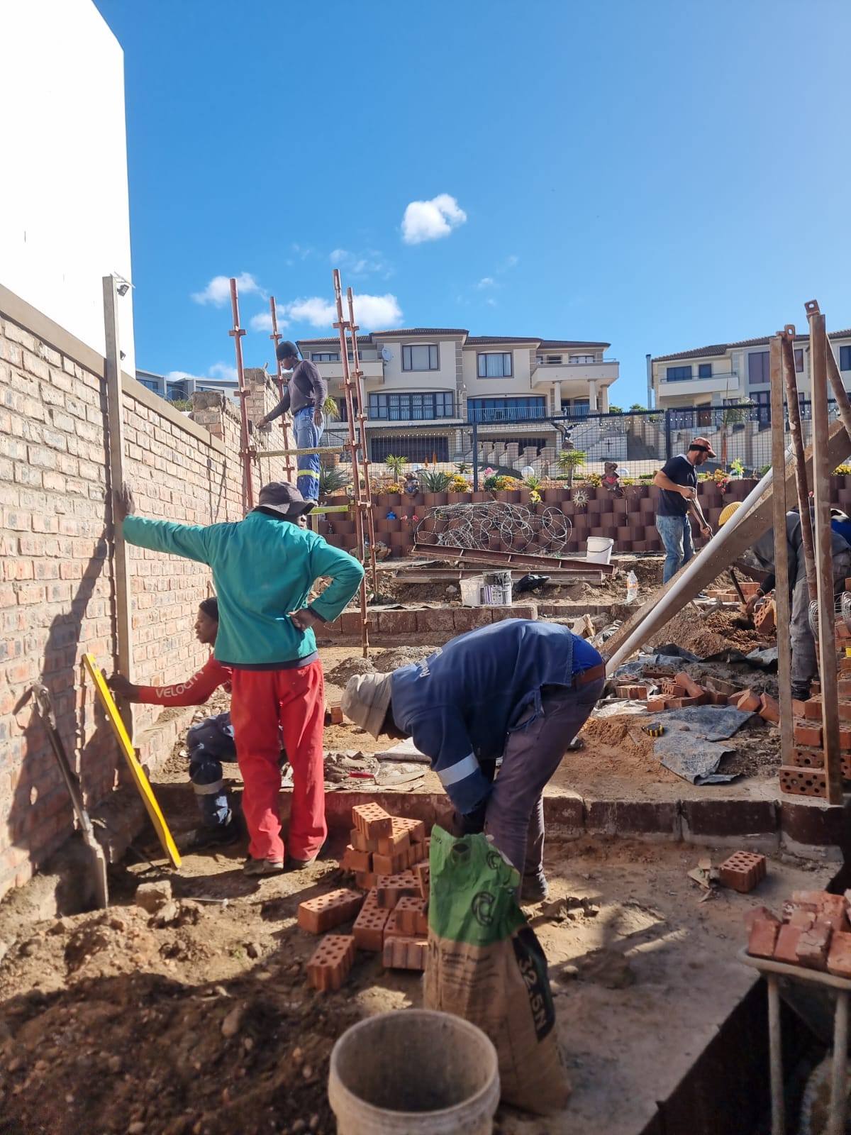 Building of a braai and a boma  and cement floor